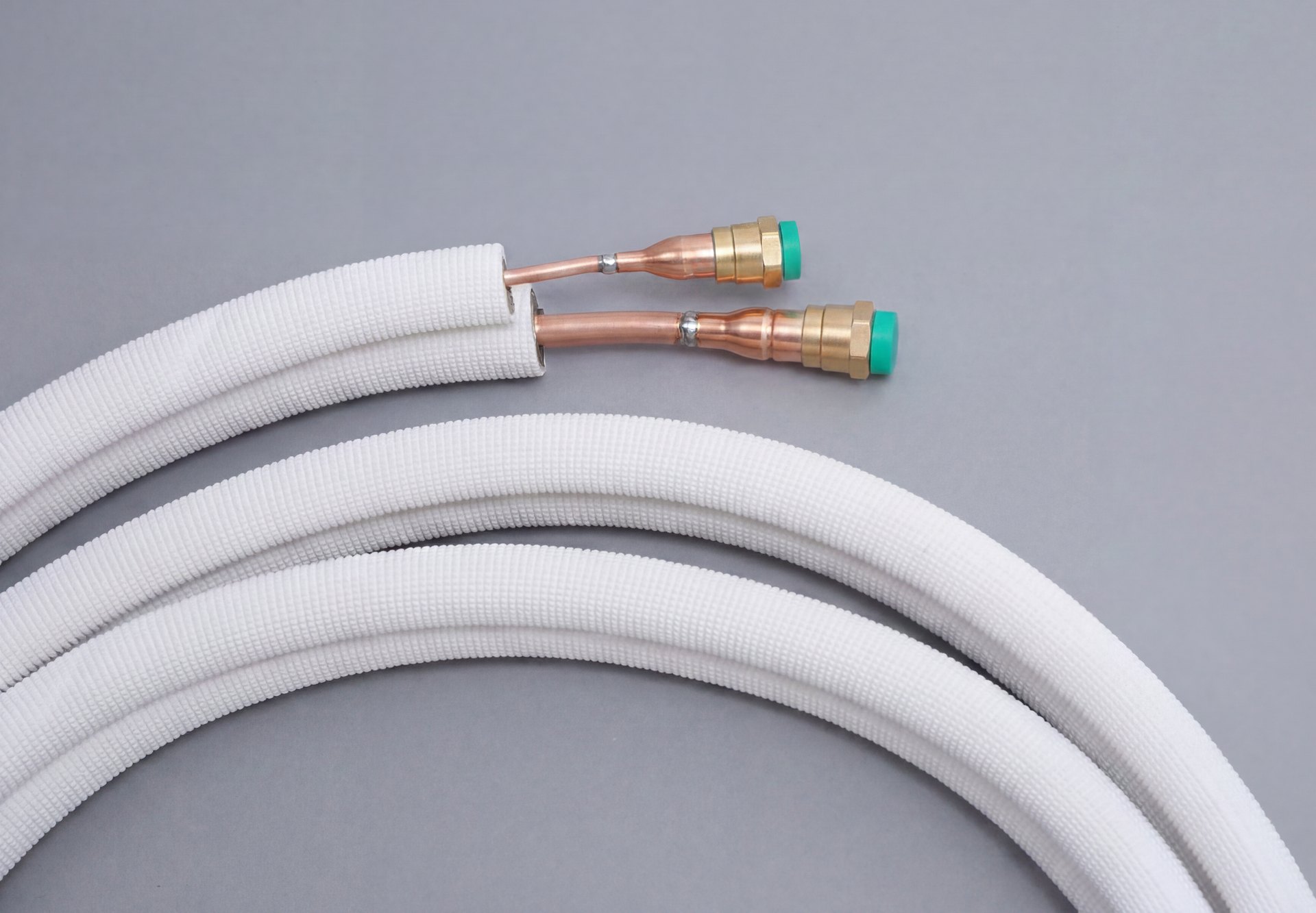 Coiled pre-insulated mini-split line set with copper quick-connect couplings